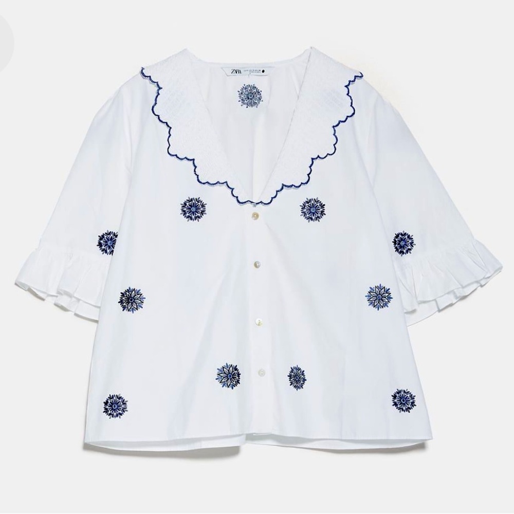OPENWORK EMBROIDERED BLOUSE V-neckline and below-the-elbow length sleeves.